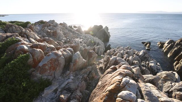 Rocky coastline of DeKelders, South Africa, overlooking Walker Bay Nature Reserve.