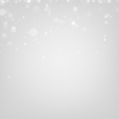Fototapeta premium White glowing dust floats gently over a dark background, forming delicate bokeh. PNG format allows easy integration into designs.