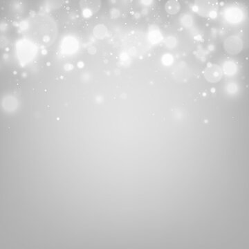 Soft white particles drift across a blurred dark canvas, forming sparkling bokeh. PNG allows seamless layering for creative projects.