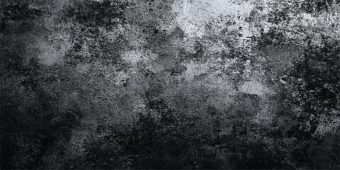 Fototapeta premium A dark aged metal surface with a rough grunge texture and vintage gray pattern creates a dirty antique backdrop for a weathered industrial design
