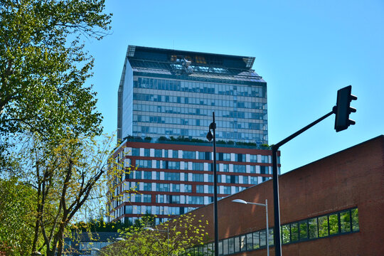 Paris, France - April 18th 2015 : Focus on modern buildings, built close to the Porte d'Auteuil, on the western side of Paris. Focus on a kind of house put on another building.