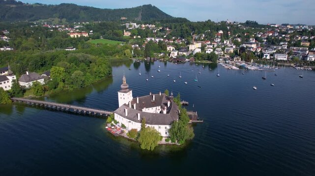 Austria Gmunden 4K Aerial Drone Video of Schloss Ort Castle on Traunsee Lake Island with Wooden Bridge at Sunrise Scenic Alpine Architecture and Autumn Landscape Travel