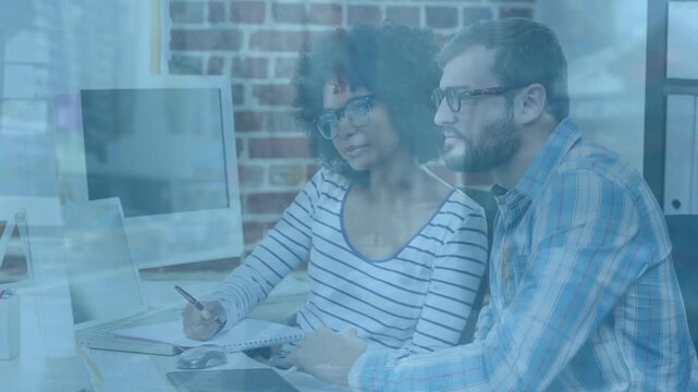 Animation of binary coding over teacher using laptop