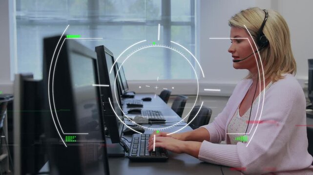 Animation of data proessing over caucasian businesswoman in office