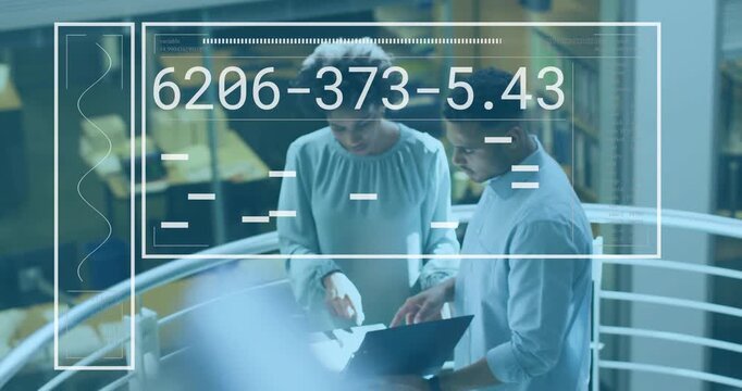 Co-workers consulting devices as digital UI appearing, cycling codes guiding data analysis