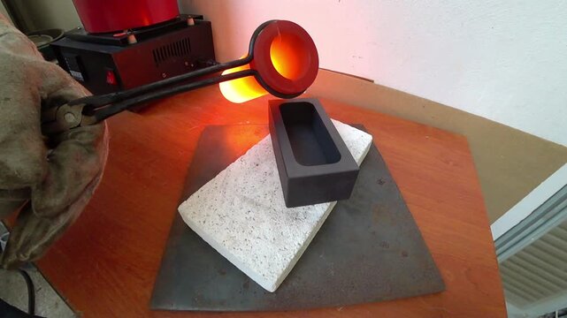 Gold 999 pure metal casting in a mold