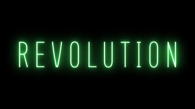 A vivid green neon sign displaying the word REVOLUTION in uppercase letters, illuminated against a completely black backdrop, suggesting change and transformation