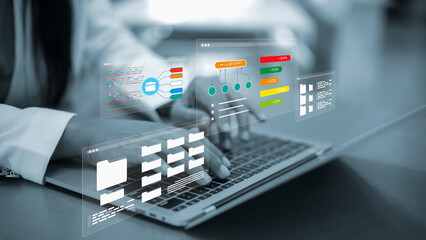 Fototapeta premium Efficient document management system for corporate business.Digital file storage and database organization.Cloud computing storage solution.Woman analyzing financial data and statistics with dms.