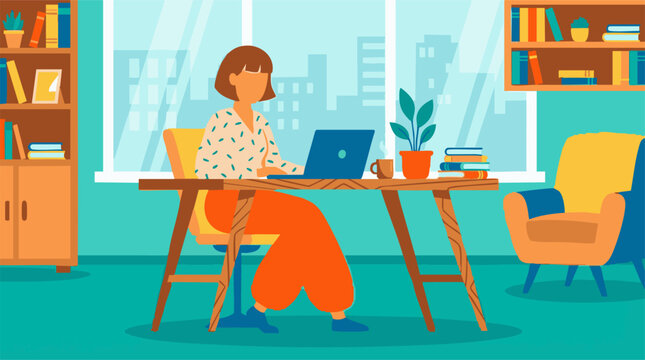 Woman working remotely on laptop at desk in a modern home office
