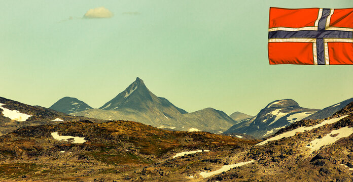 Mountain panorama in Jotunheimen with Norwegian flag