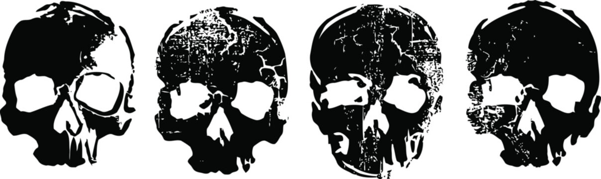 Grunge black skull silhouettes in various decayed and textured styles on white background