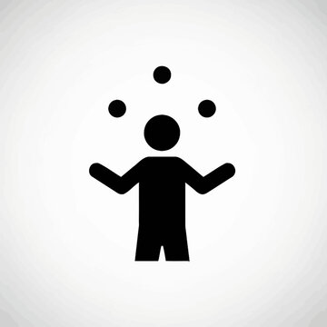 Silhouette of a person juggling multiple objects in the air performing a skill.