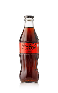 Coca-cola zero sugar glass bottle refreshing drink solution on a white background