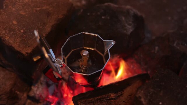 Close-up of Moka Pot Brewing Coffee on a Campfire - Outdoor Lifestyle