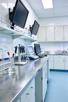 Modern laboratory room with various scientific instruments