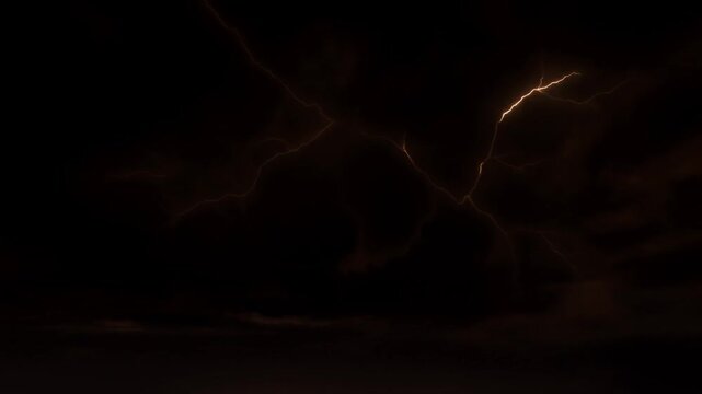Slow motion static shot of lightning bolts crackling and branching across stormy thundercloud sky over dark horizon at night