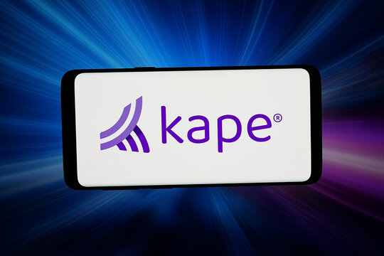 Stuttgart, Germany - 03-26-2026: In this photo illustration, the logo of cybersecurity company Kape Technologies plc is displayed on a smartphone in front of abstract background on computer screen.
