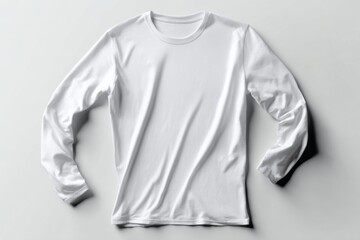 White long sleeve shirt lying on white background.