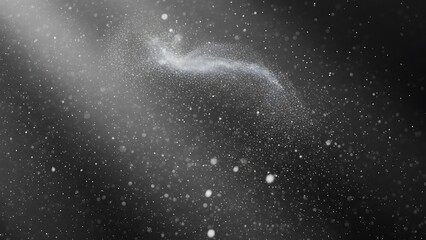Fototapeta premium Stunning black and white cosmic dust background showcasing a beautiful sparkling particle swirl in a diagonal shaft of light.