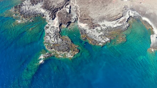 Aerial Panoramic View of Crystal Clear Waters and Marine Sanctuary in Mar de las Calmas, Tacoron Recreation Swimming and Picnic area, El Hierro