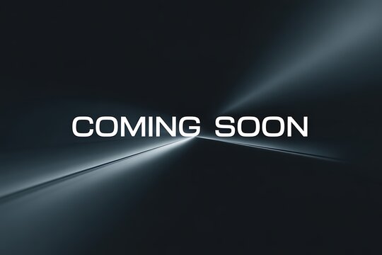 A dark background with a beam of light and the words 'Coming Soon' in white text