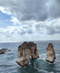 Fototapeta premium Scenic view of the Raouche Rocks (Pigeon's Rock) in the Mediterranean Sea, Beirut, Lebanon.