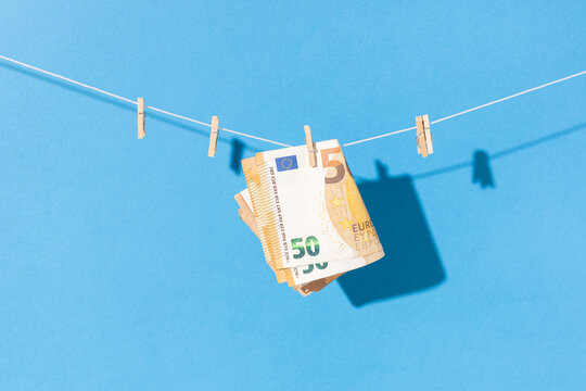 fifty euro bills hanging on a clothesline. Money laundering concept