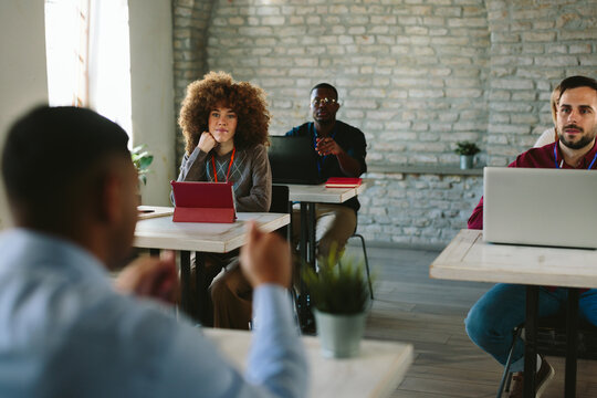 Diverse business professionals attending a startup conference meetup