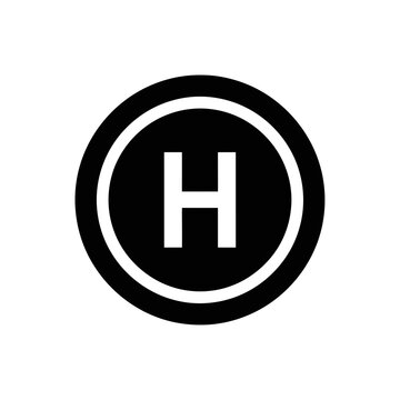 Black and white helicopter landing pad symbol circular design.