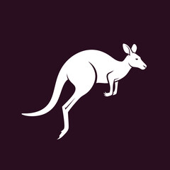 Obraz premium White kangaroo silhouette leaping against a dark background isolated image.