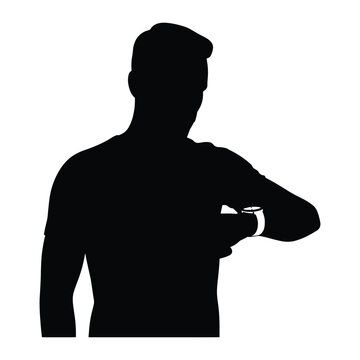 A stark black silhouette of a man checking his wristwatch a powerful visual statement silhouette