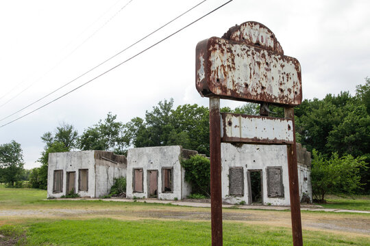 Abandoned Route 66 Buildings with Rusted Roadside Sign