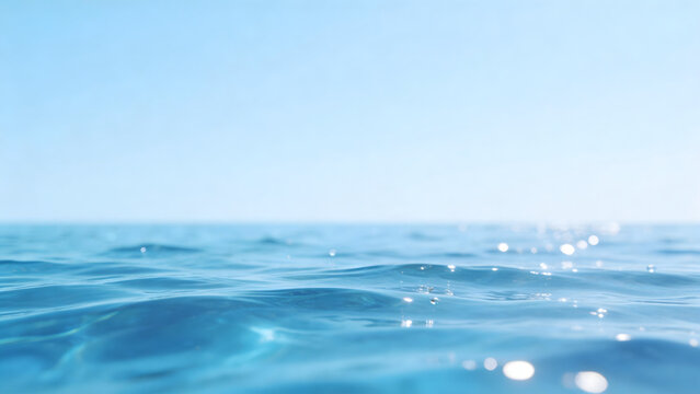 Blue ocean water with sky reflection
