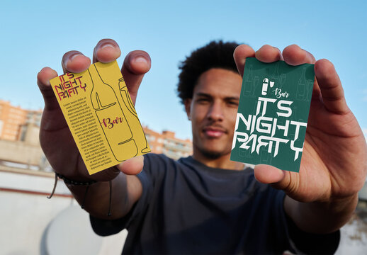Business Card Mockup Held by a Man