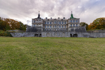 Fototapeta premium Renaissance Pidhirtsi Castle with dramatic storm clouds in Ukraine