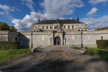 Fototapeta premium Renaissance Pidhirtsi Castle with dramatic storm clouds in Ukraine