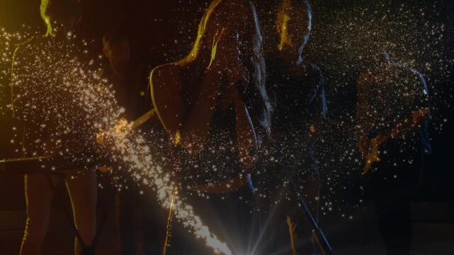 Vertical video: Lead singer singing while right light sending spark arc, filling band for music