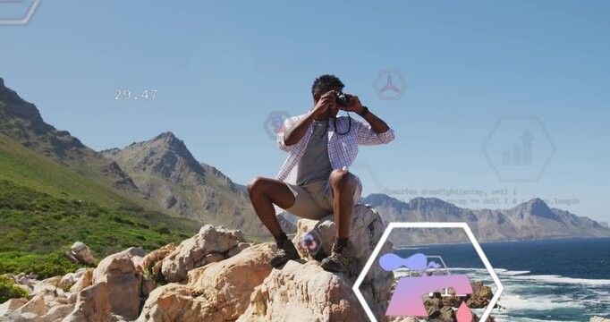 Man raising binoculars on rock and activating tech HUD showing bar charts, scanning coast for data