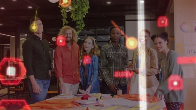Design team checking fabrics, red hex overlay passing, causing tablet tapping and turning smiling