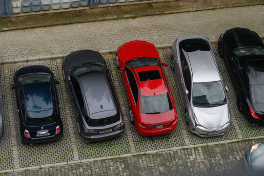 March 30, 2026, Tbilisi, Georgia Row of Parked Cars Including Silver Toyota Prius and Red Sedan, Top View