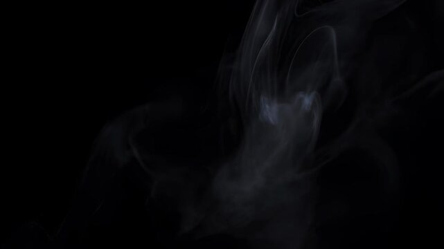 Ethereal smoke swirling against a black background. Captivating visual for artistic projects, evoking mystery and intrigue