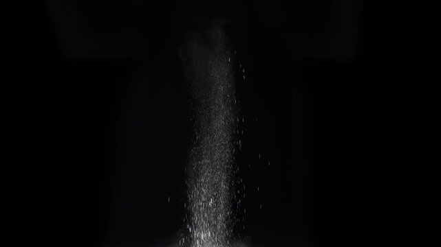 Big Explosion of Snow. A column of soil and dust rises into the air from the explosion. Isolated on black. Use in blend modes to simulate a battlefield
