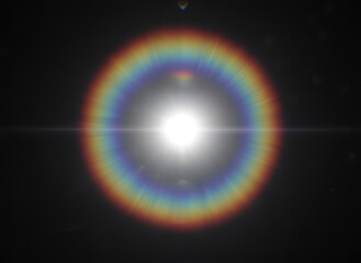 Abstract Rainbow Lens Flare with Bright Light Burst on Black © ossama