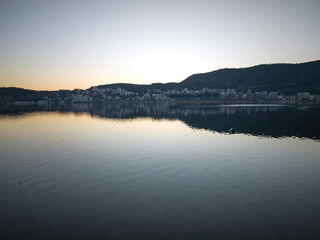 Fototapeta premium Panorama of Lake Orestiada around town of Kastoria, Greece