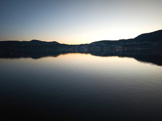 Fototapeta premium Panorama of Lake Orestiada around town of Kastoria, Greece