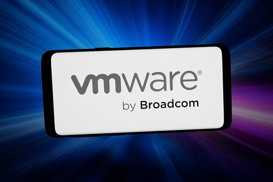Stuttgart, Germany - 03-26-2026: In this photo illustration, the logo of US cloud computing company VMware LLC is displayed on a smartphone in front of abstract background on computer screen.