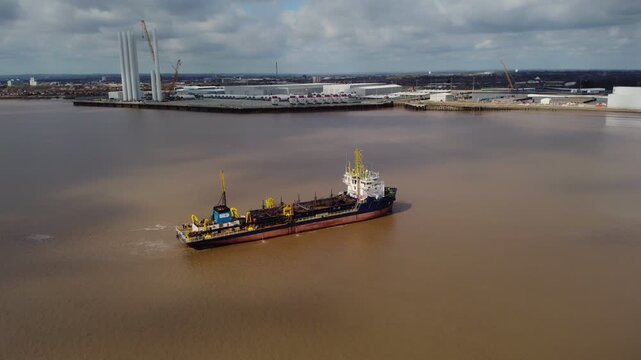 Trailing suction hopper dredger on the river Hull.