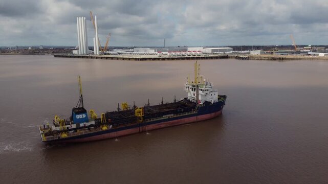 Trailing suction hopper dredger on the river Hull.