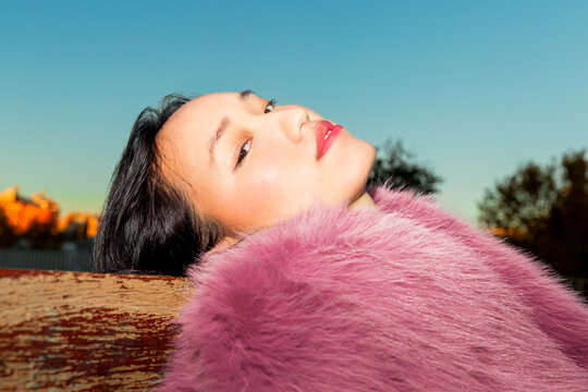 Portrait of a stylish Asian woman in urban setting