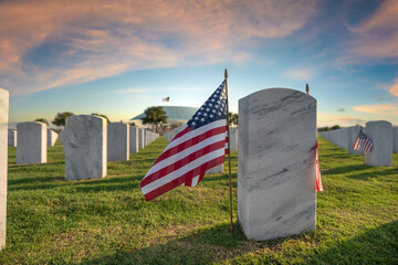 Naklejka premium American army Sarasota National Cemetery with rows of white tombstones and USA flag on green grass. Memorial Day concept
